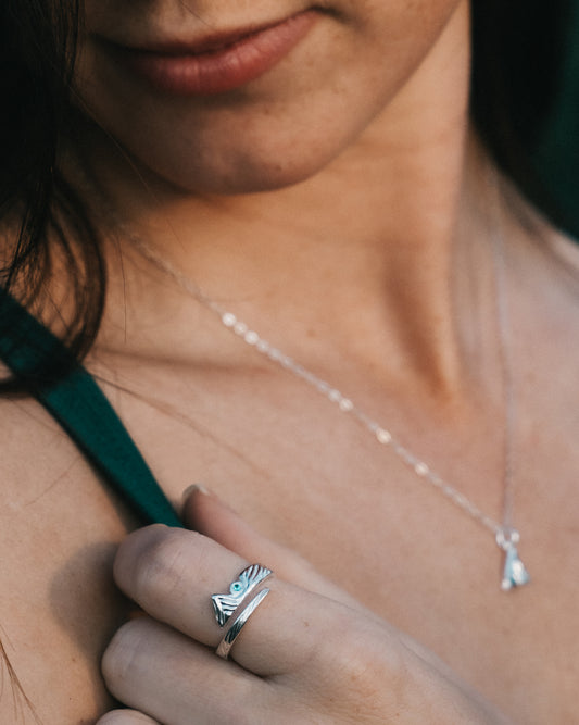 Adjustable sterling silver mountain ring with emerald