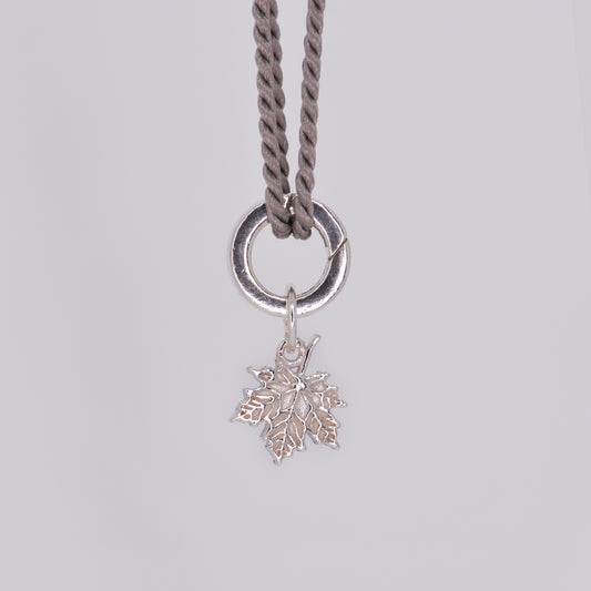 The Maple Leaf Charm
